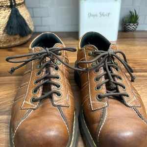 Brown dr martens lace front shoes